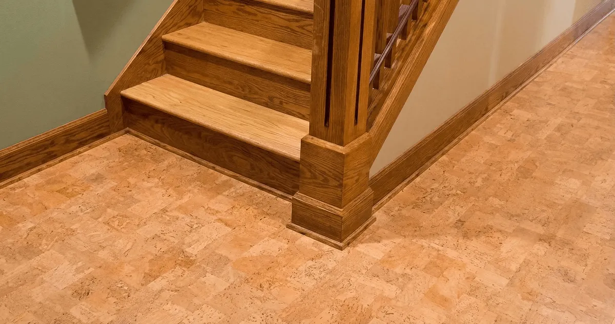 End of a staircase with cork flooring in Pembroke Pines, FL