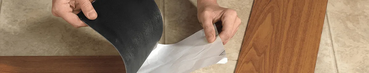 A professional installing vinyl flooring in Pembroke Pines, FL